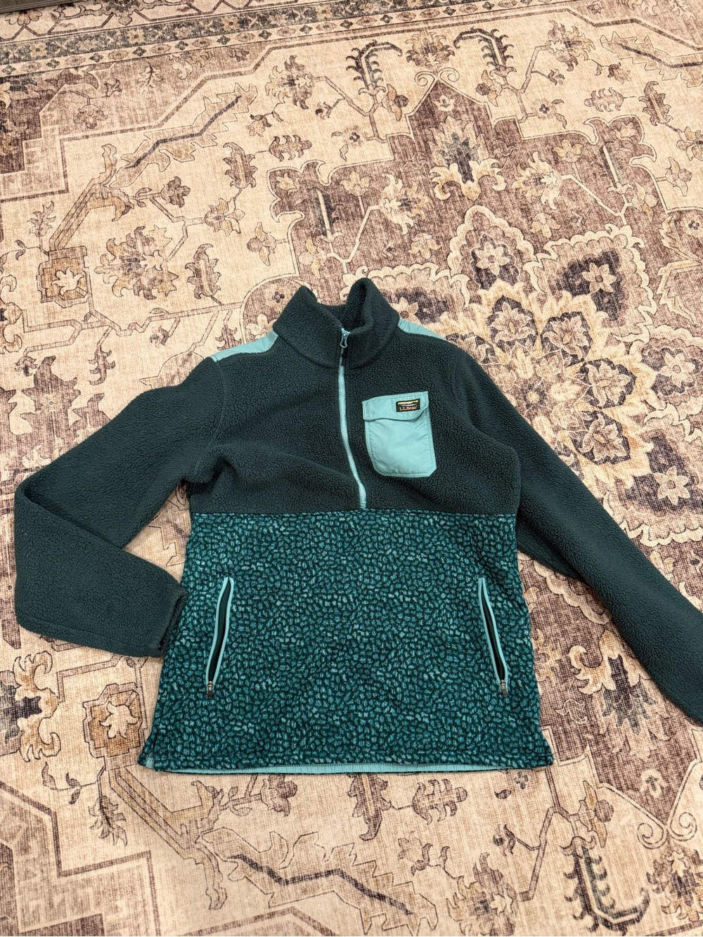 L.L. Bean cozy camp quarter-zip fleece pullover in a green color-blocked pattern